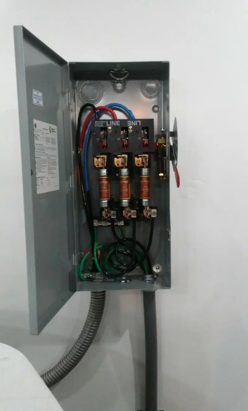Three-phase disconnect switch installed for Smoke Detector Installation in South Russell